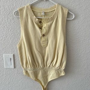 FP intimately yellow bodysuit. size small